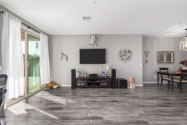 living room featuring dark wood-type flooring