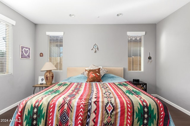 bedroom featuring dark hardwood / wood-style floors