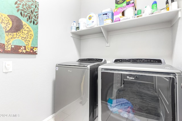 washroom featuring washer and dryer