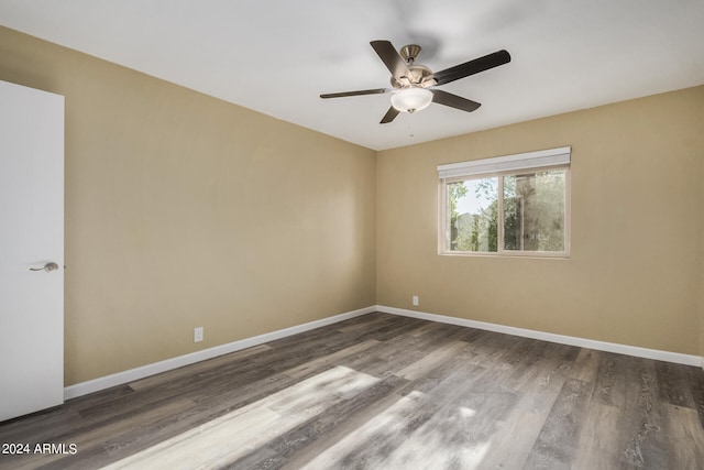 unfurnished room featuring hardwood / wood-style flooring and ceiling fan