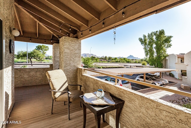 balcony featuring a mountain view