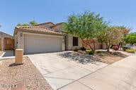 16813 S 30th Ave, Phoenix, AZ 85045 - view of front of property with driveway and an attached garage
