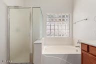 16813 S 30th Ave, Phoenix, AZ 85045 - full bathroom with vanity, a stall shower, and a bath