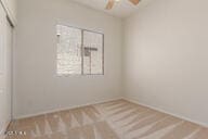 16813 S 30th Ave, Phoenix, AZ 85045 - spare room with baseboards and a ceiling fan