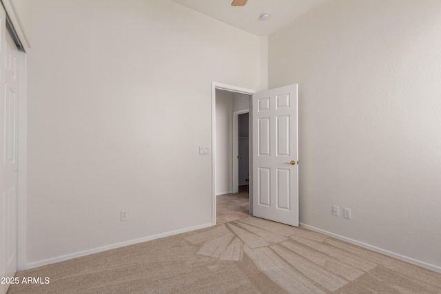 16813 S 30th Ave, Phoenix, AZ 85045 - spare room with light colored carpet, baseboards, and a ceiling fan