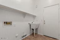 16813 S 30th Ave, Phoenix, AZ 85045 - washroom featuring washer hookup and baseboards