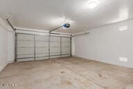 16813 S 30th Ave, Phoenix, AZ 85045 - garage featuring a garage door opener