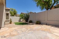 16813 S 30th Ave, Phoenix, AZ 85045 - fenced backyard featuring a patio area