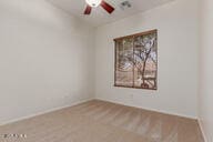 16813 S 30th Ave, Phoenix, AZ 85045 - carpeted empty room featuring ceiling fan and baseboards