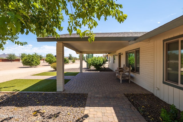 view of patio featuring a carport