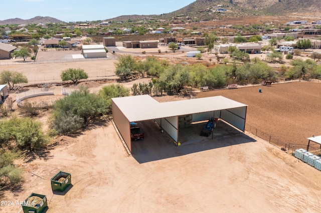 drone / aerial view featuring a mountain view