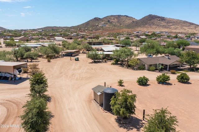 drone / aerial view featuring a mountain view