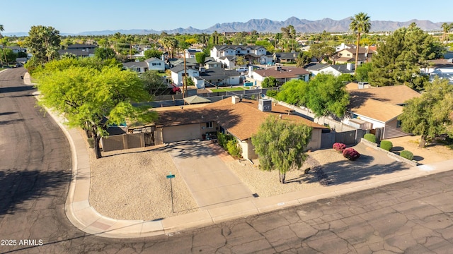 bird's eye view featuring a mountain view and a residential view