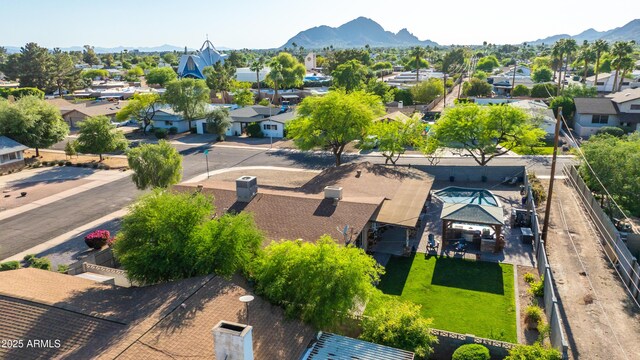 drone / aerial view with a residential view and a mountain view