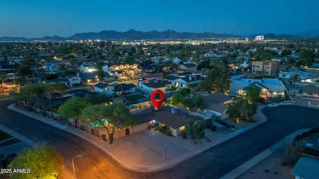 aerial view with a mountain view and a residential view