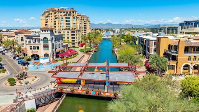 view of community featuring a water and mountain view