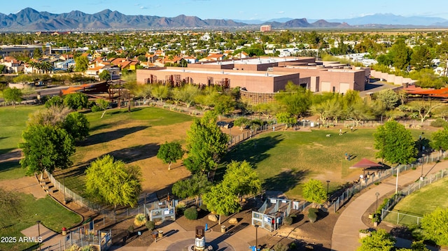 birds eye view of property featuring a mountain view and a residential view