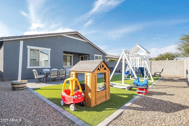 view of play area featuring a patio area