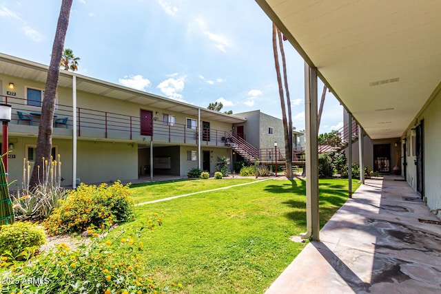 view of yard featuring visible vents