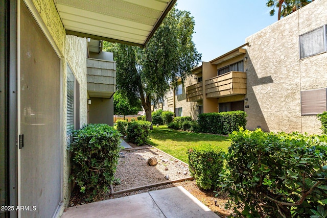 exterior space with a yard