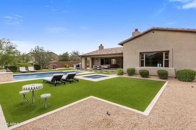 20055 N 96th Way, Scottsdale, AZ 85255 - view of yard featuring an in-ground hot tub, a patio, and an outdoor hangout area