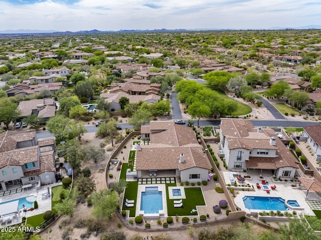 20055 N 96th Way, Scottsdale, AZ 85255 - aerial perspective of suburban area with a pool and a mountain backdrop
