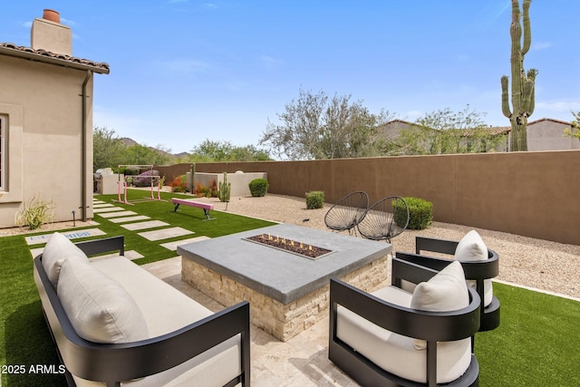 20055 N 96th Way, Scottsdale, AZ 85255 - fenced backyard featuring an outdoor fire pit and a patio