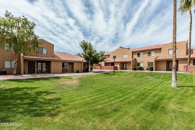 view of yard featuring a residential view and cooling unit
