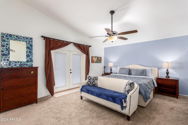 carpeted bedroom with french doors, ceiling fan, and vaulted ceiling