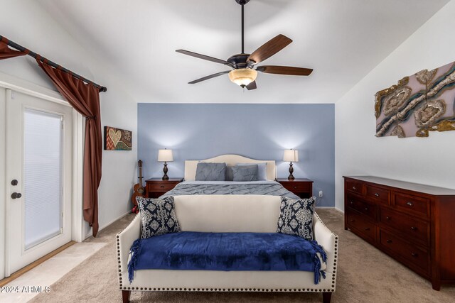 bedroom featuring light colored carpet and ceiling fan