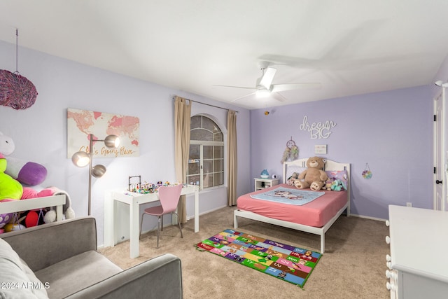 bedroom featuring light carpet and ceiling fan