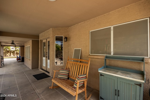 view of patio featuring ceiling fan