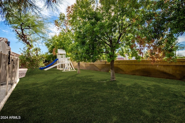 view of yard featuring a playground