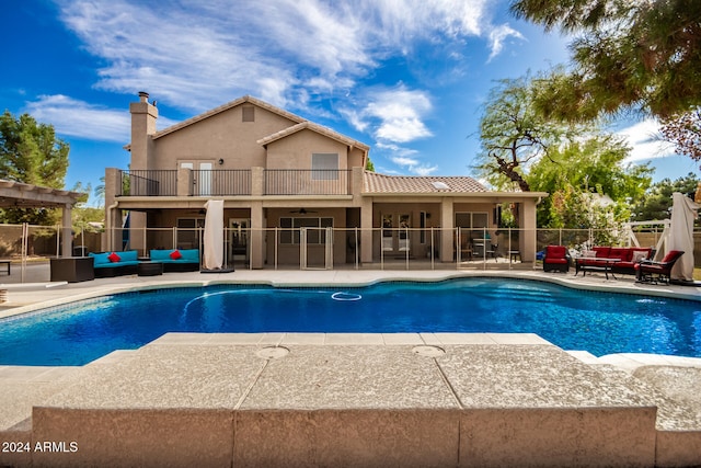 view of pool with a patio and an outdoor hangout area