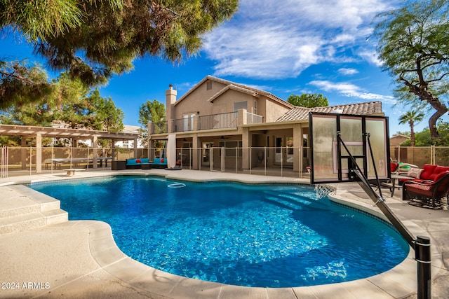 view of swimming pool with a patio