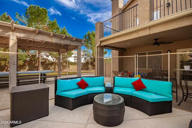 view of patio featuring ceiling fan, a balcony, and outdoor lounge area