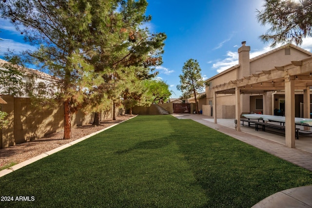 view of yard with a patio area and a pergola