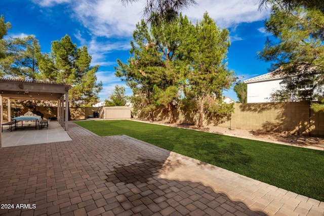 view of yard featuring a patio and a pergola