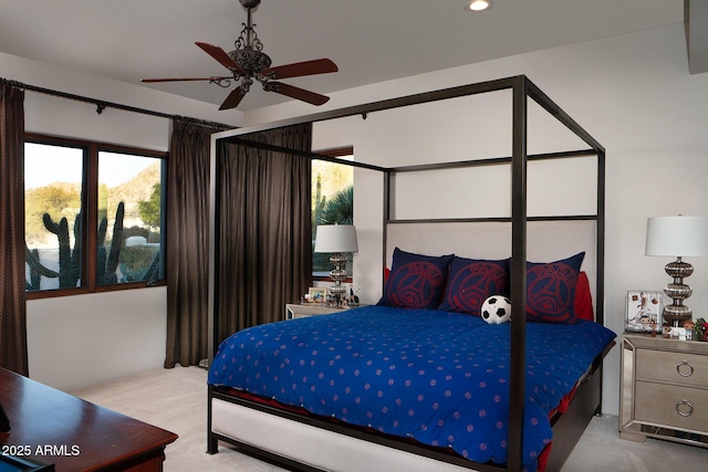 bedroom with a ceiling fan, recessed lighting, and carpet