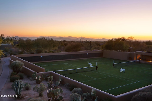 view of sport court with a mountain view