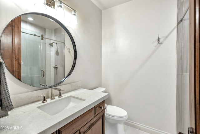 full bath with vanity, toilet, a stall shower, and tile patterned flooring