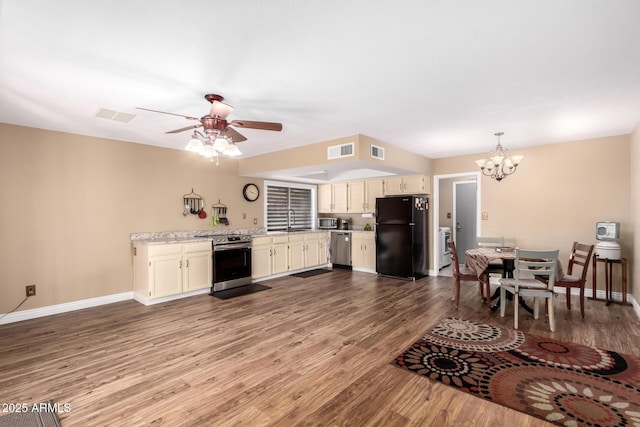 kitchen with visible vents, appliances with stainless steel finishes, light countertops, and a sink