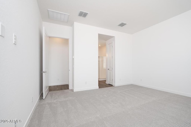352 E Las Perlas Ln, San Tan Valley, AZ 85140 - unfurnished bedroom featuring carpet and baseboards