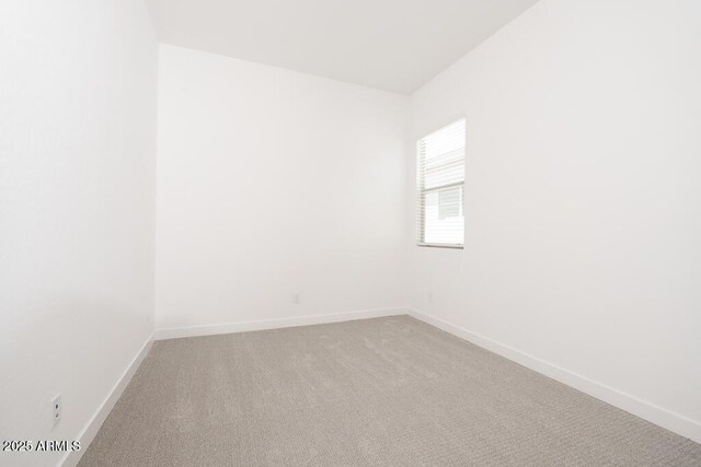 352 E Las Perlas Ln, San Tan Valley, AZ 85140 - carpeted empty room featuring baseboards
