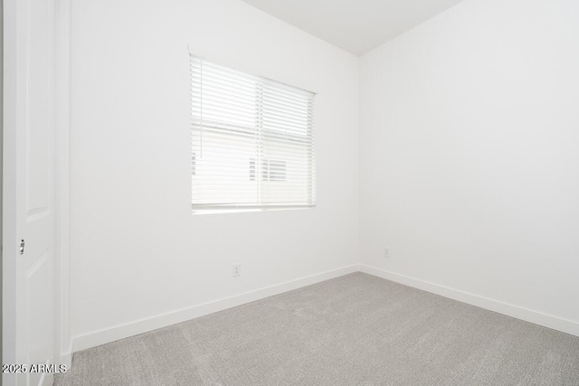 352 E Las Perlas Ln, San Tan Valley, AZ 85140 - spare room featuring carpet floors and baseboards