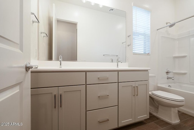 352 E Las Perlas Ln, San Tan Valley, AZ 85140 - bathroom with double vanity, toilet, bathing tub / shower combination, and wood finished floors