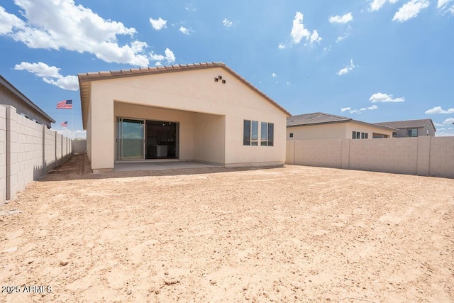 352 E Las Perlas Ln, San Tan Valley, AZ 85140 - rear view of house featuring a fenced backyard, a patio area, stucco siding, and a tile roof