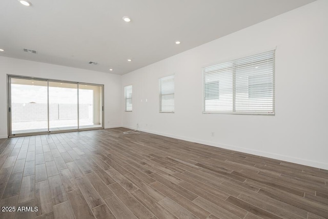 352 E Las Perlas Ln, San Tan Valley, AZ 85140 - unfurnished room featuring wood finished floors, baseboards, and recessed lighting