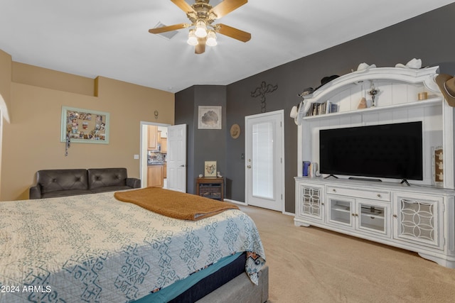 bedroom with ceiling fan and light colored carpet