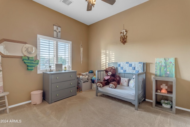 living area featuring ceiling fan and light carpet